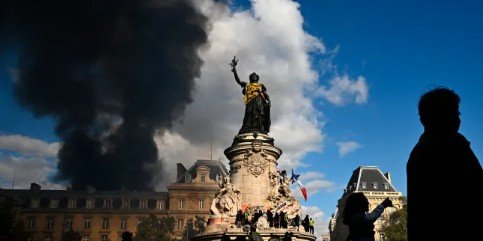 Violent protests and looting in France over rising living costs, with police confronting demonstrators in Paris.