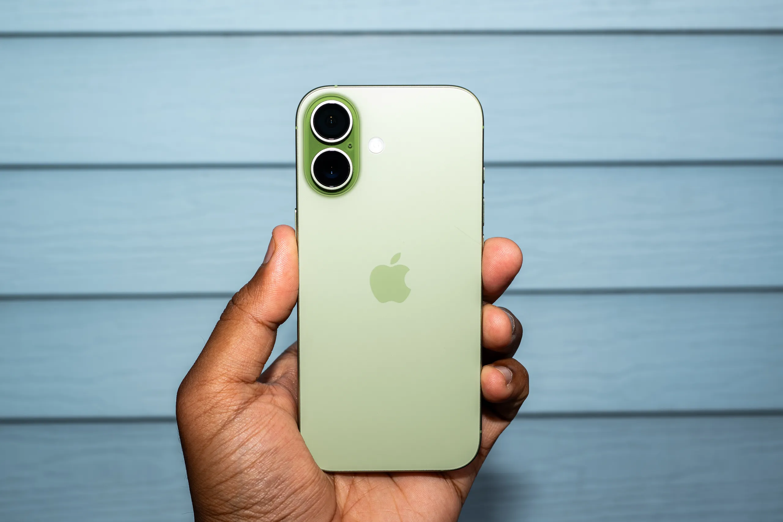 Apple iPhones displayed in a store illustrating reported purchase limits in India