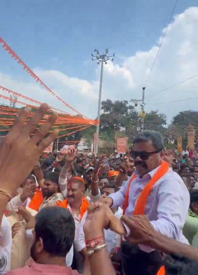 Renukacharya dancing during Honnali Ganapati immersion procession