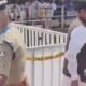 Karnataka ministers and police personnel during the Mysuru Dasara Jamboo Savari proceedings.