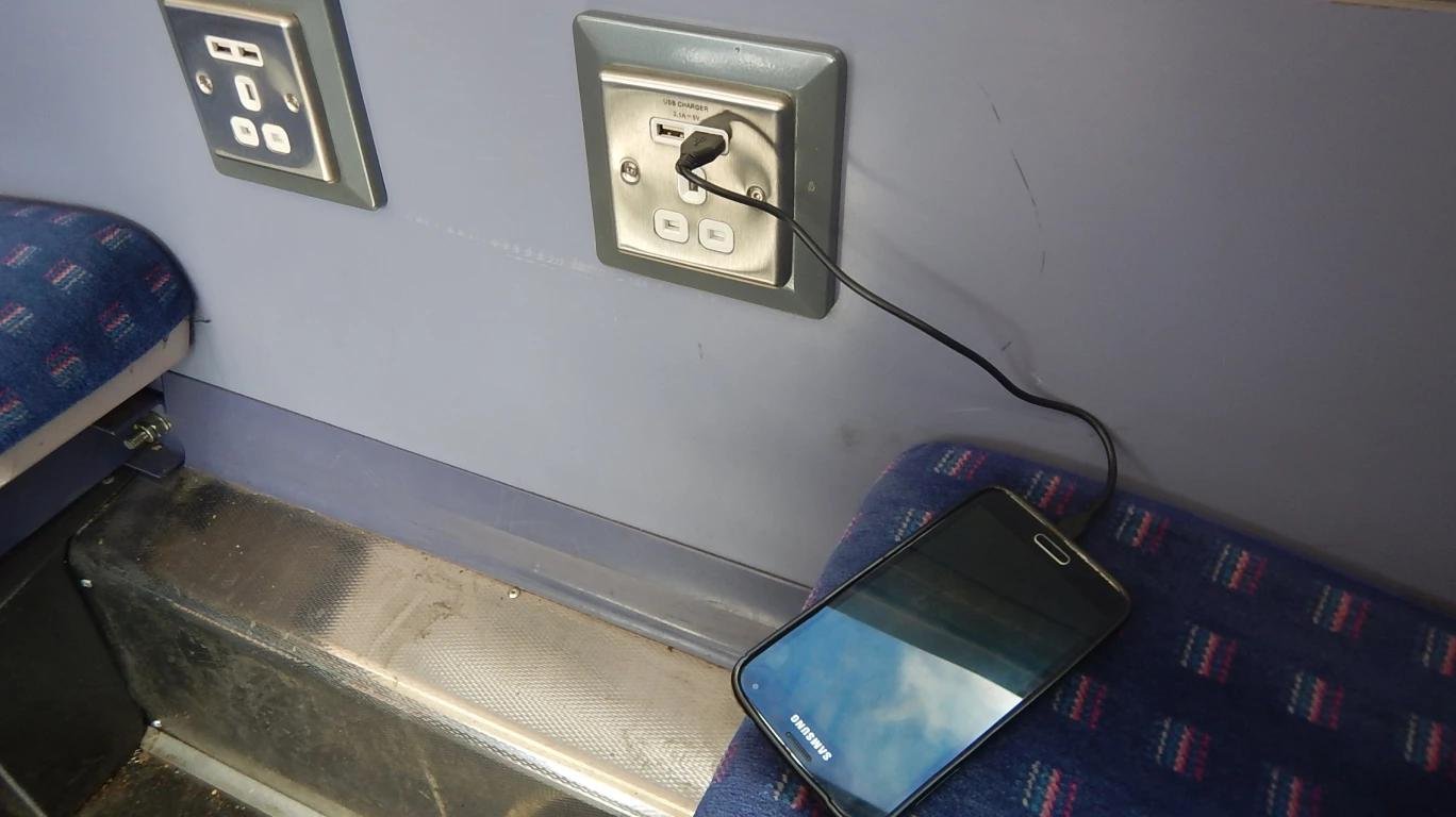 Train mobile charging point affected by Indian Railways night charging restrictions.