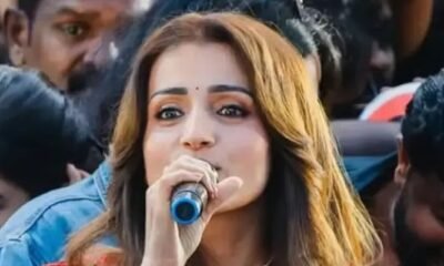 Trisha Krishnan greeting fans at a Coimbatore showroom opening event