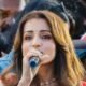 Trisha Krishnan greeting fans at a Coimbatore showroom opening event